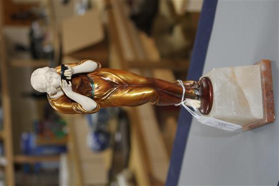 An Art Deco style resin figure of a lady, height 28cm